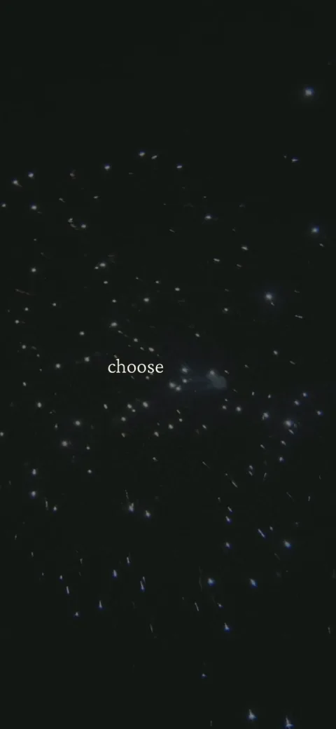 222 onboarding screen 55: 'choose' alone on a starfield - the film shifts from party imagery to abstract cosmic visuals as it builds…