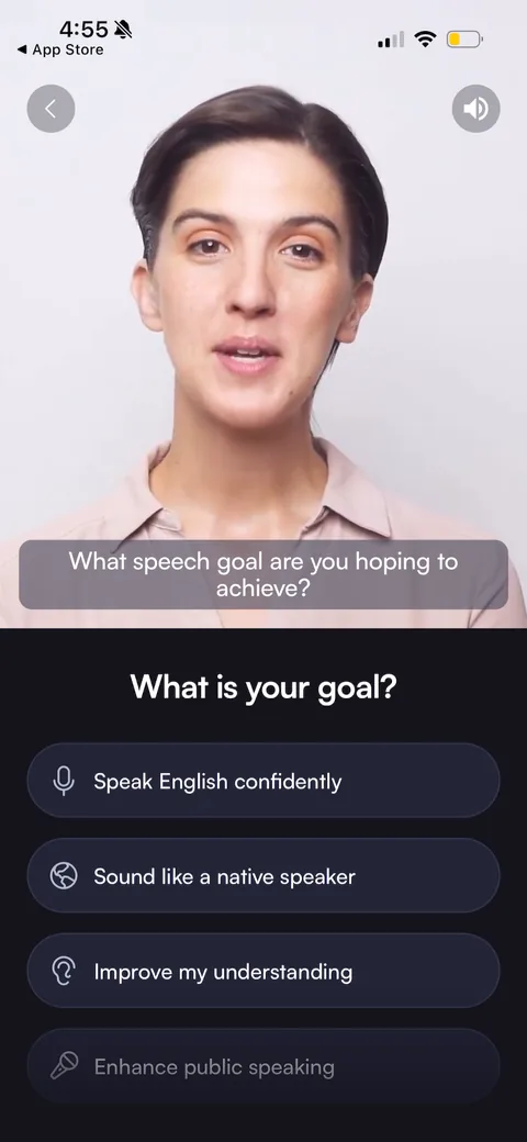 BoldVoice onboarding screen 16: Goal-setting question ('What is your goal?') with the coach video still narrating the prompt
