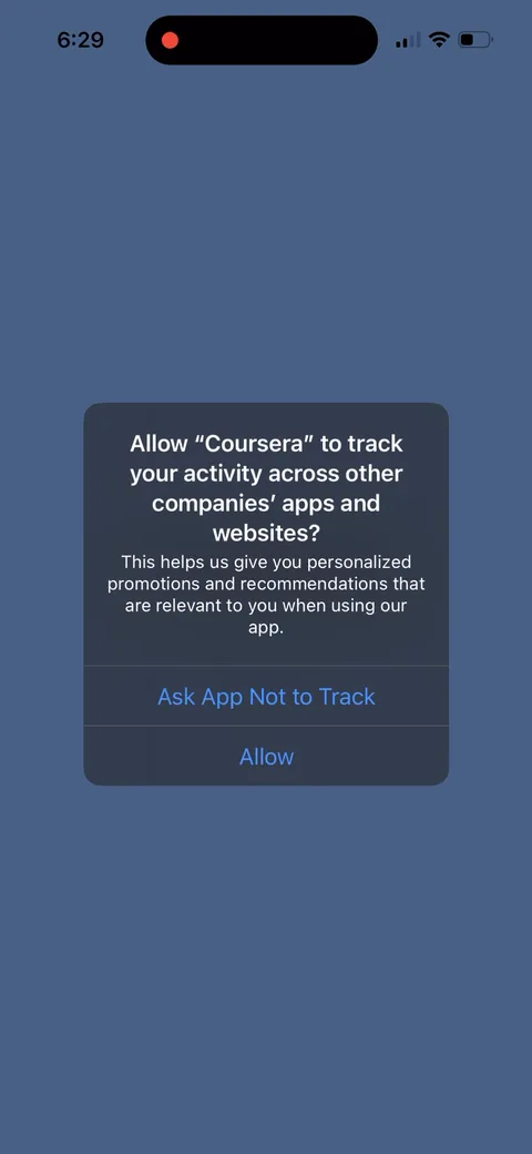 Coursera onboarding screen 2: The ATT prompt is the first thing that happens, before a single screen of product