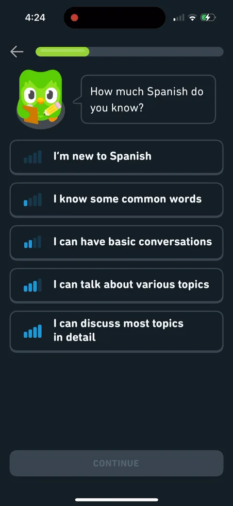 Duolingo onboarding screen 21: 'How much Spanish do you know?' with five honest bands from 'I'm new to Spanish' to 'I can discuss most…