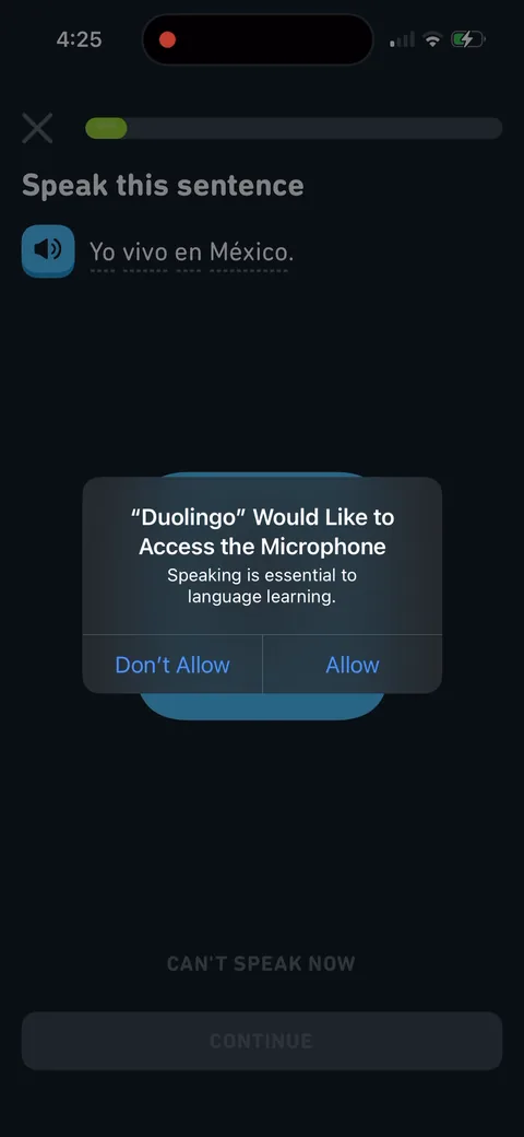 Duolingo onboarding screen 39: The microphone permission arrives inside the exercise, at the moment speaking is required, with 'Speaking is…