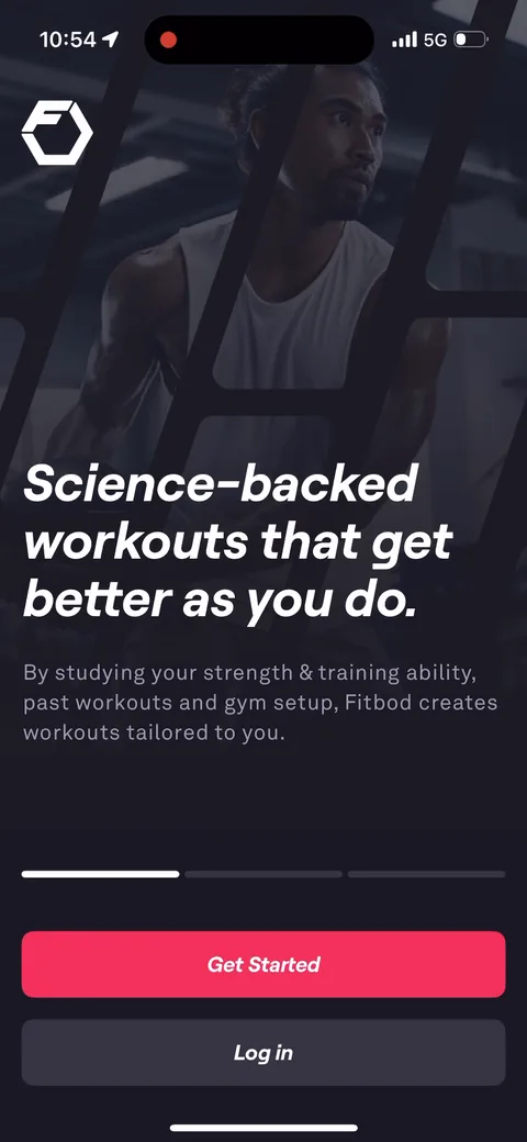 Fitbod onboarding screen 2: 'Science-backed workouts that get better as you do.' A 3-slide value prop carousel with Get Started and Log…