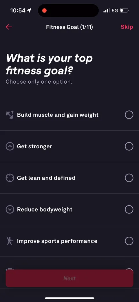 Fitbod onboarding screen 6: 'Fitness Goal (1/11)' with a Skip in the corner