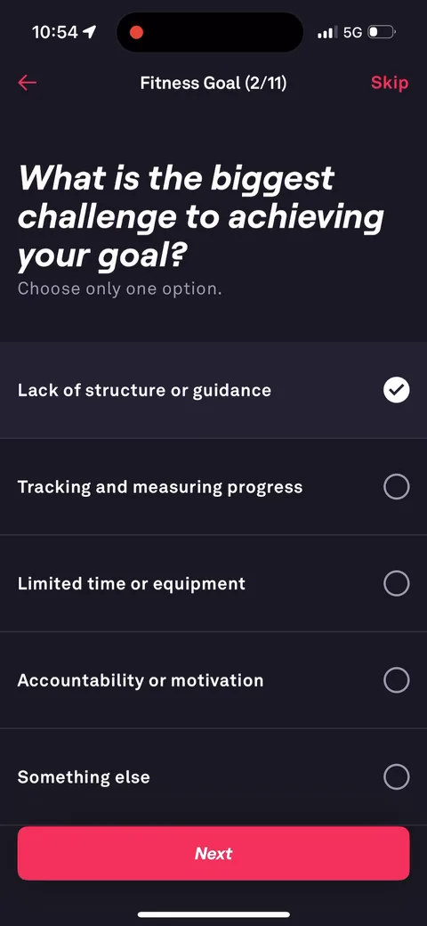 Fitbod onboarding screen 13: 'What is the biggest challenge to achieving your goal?' Lack of structure, tracking progress, limited time or…