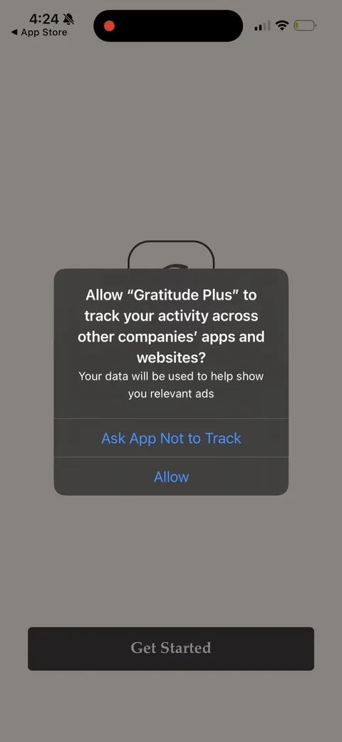 Gratitudeplus onboarding screen 1: ATT tracking prompt as the literal first screen, before they've seen anything