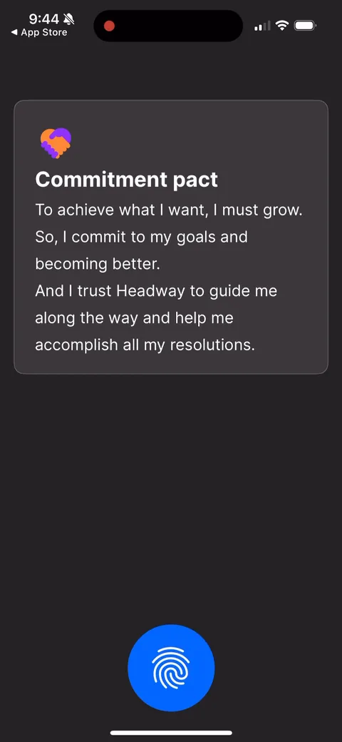 Headway onboarding screen 55: Tap-and-hold commitment pact written in first person ('I commit to my goals')