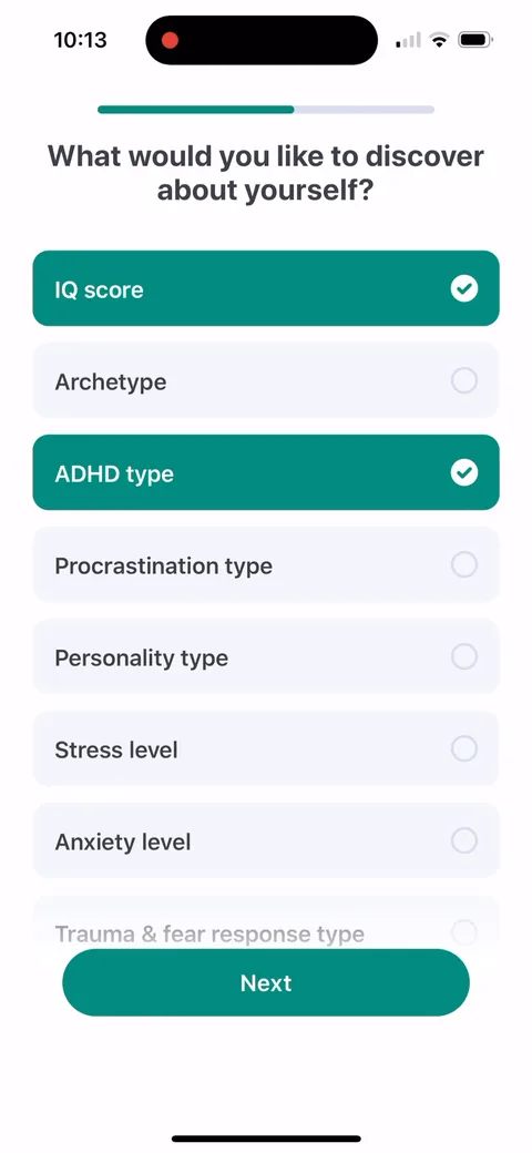 Impulse onboarding screen 21: 'What would you like to discover about yourself?' IQ score, archetype, ADHD type, procrastination type…