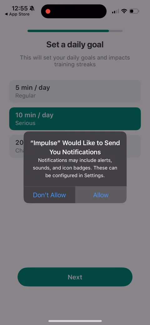 Impulse onboarding screen 19: Notification permission fires during 'set a daily goal,' tied to streaks