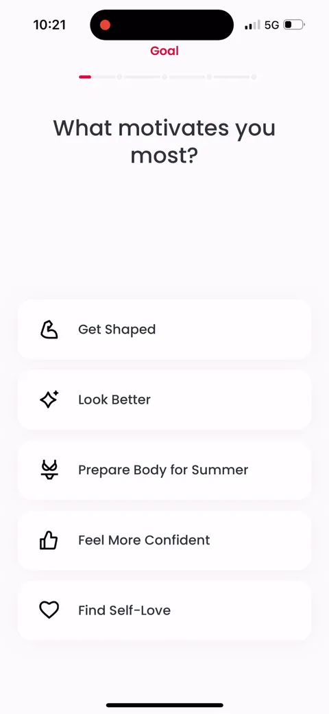 Justfit onboarding screen 5: Motivation question leads with emotion, not metrics: 'feel more confident,' 'find self love,' not just 'lose…