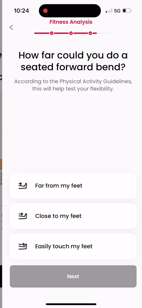 Justfit onboarding screen 48: Flexibility self-test ('how far can you do a seated forward bend')