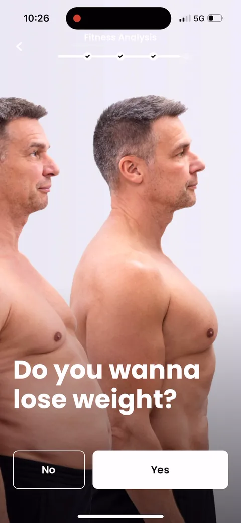 Justfit onboarding screen 63: 'Do you wanna lose weight?' One blunt yes/no right before the plan-building loader