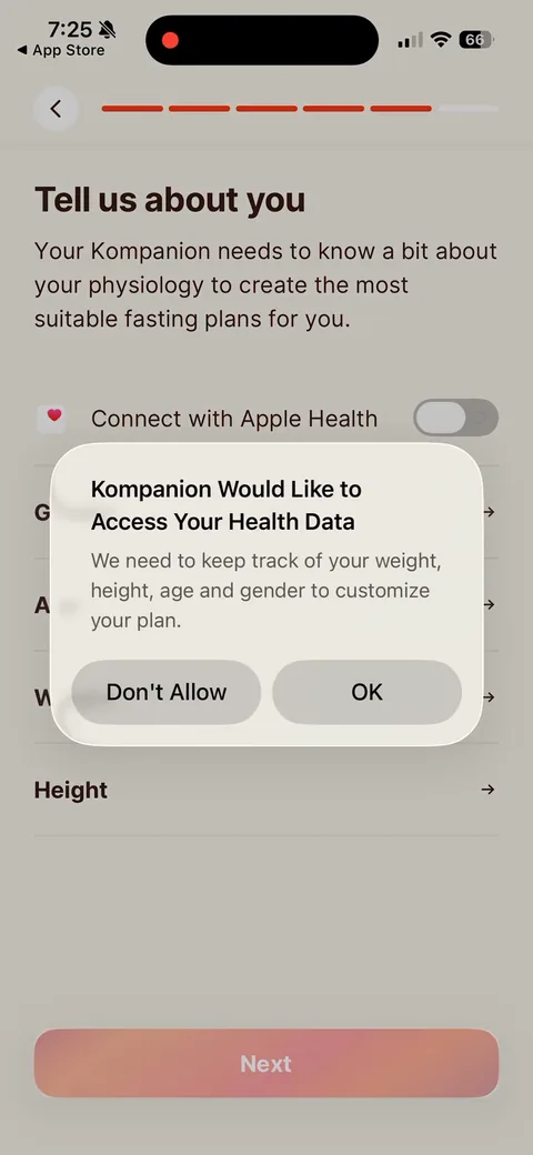 Kompanion onboarding screen 27: Custom pre-prompt before the Apple Health sheet: 'We need to keep track of your weight, height, age and…