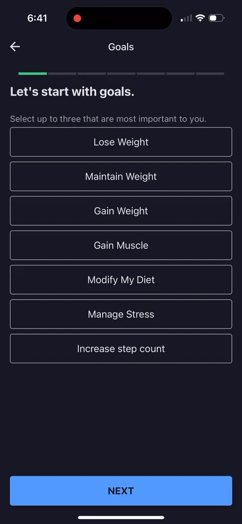 Myfitnesspal onboarding screen 11: Goals as a multi-select, 'select up to three.' Fitness goals overlap (lose weight, gain muscle, manage…