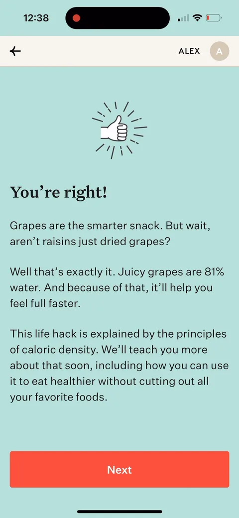Noom onboarding screen 84: A free micro-lesson, grapes vs raisins, 'grapes are 81% water,' delivered before the paywall