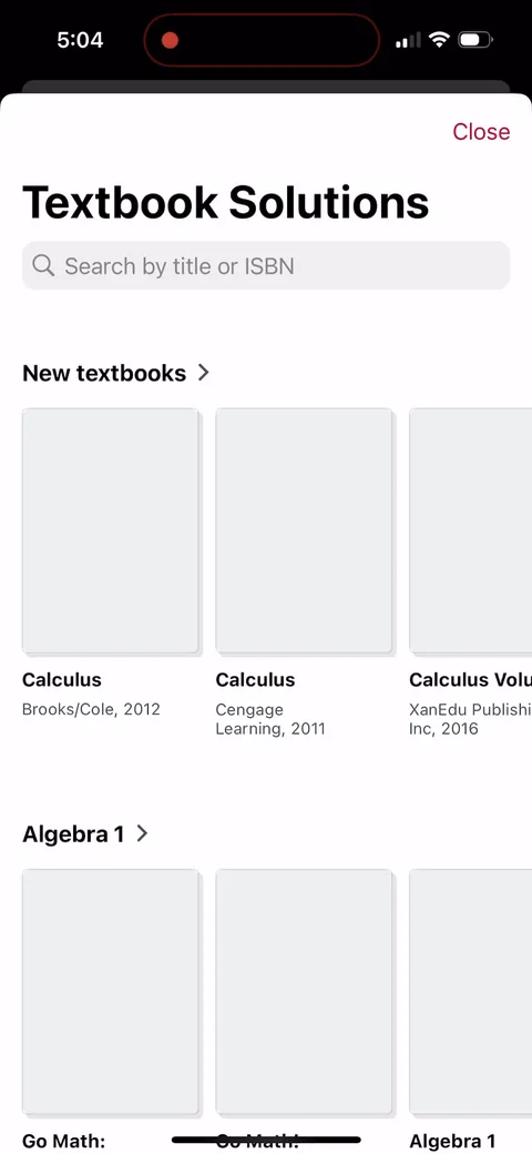 Photomath onboarding screen 9: Textbook Solutions is browsable before you pay, down to the individual book and edition