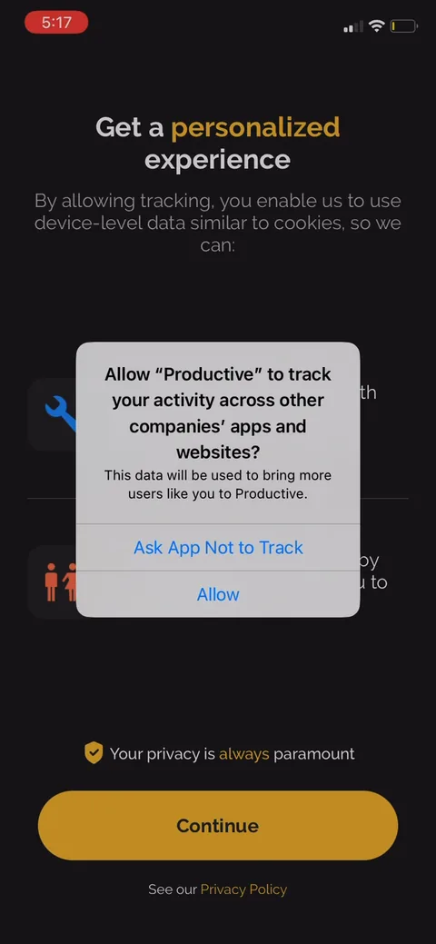 Productive onboarding screen 23: iOS tracking prompt softened with a benefit screen first: 