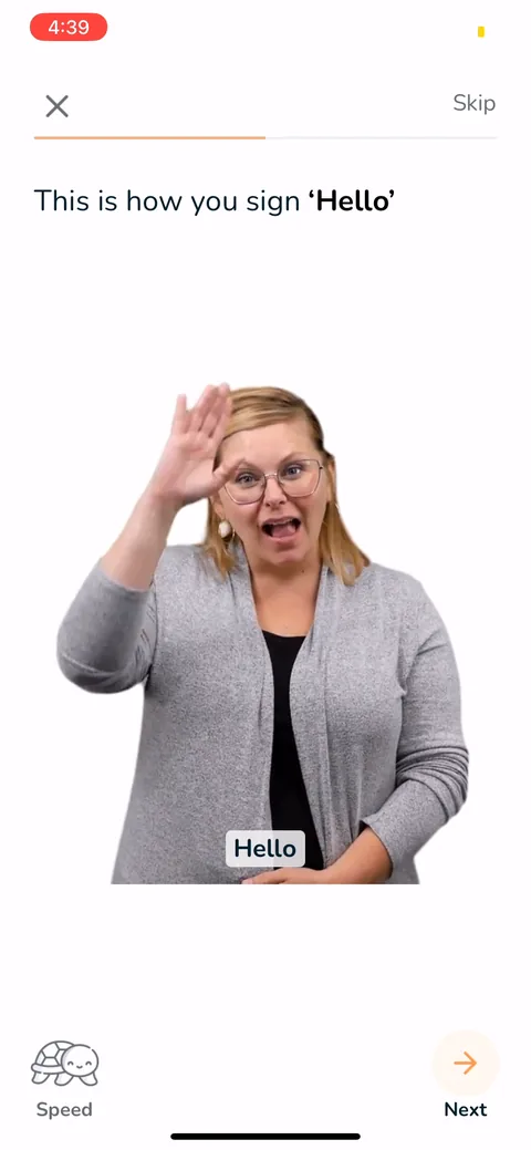 Signlab Asl Bloom onboarding screen 9: Straight into a video of someone signing 'Hello.' First real value, and it's the actual product, not an…