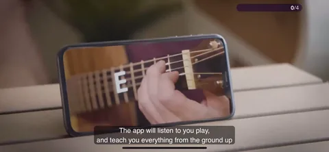 Simply Guitar onboarding screen 18: 'The app will listen to you play and teach you everything from the ground up.' This is the core mechanic…