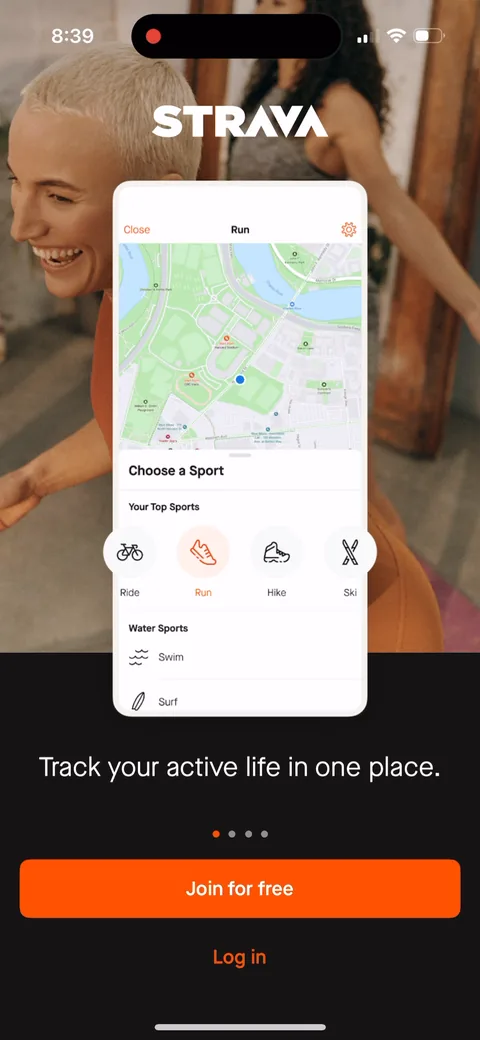 Strava onboarding screen 2: 'Track your active life in one place' over a phone mockup of the real record screen with 'Choose a Sport'