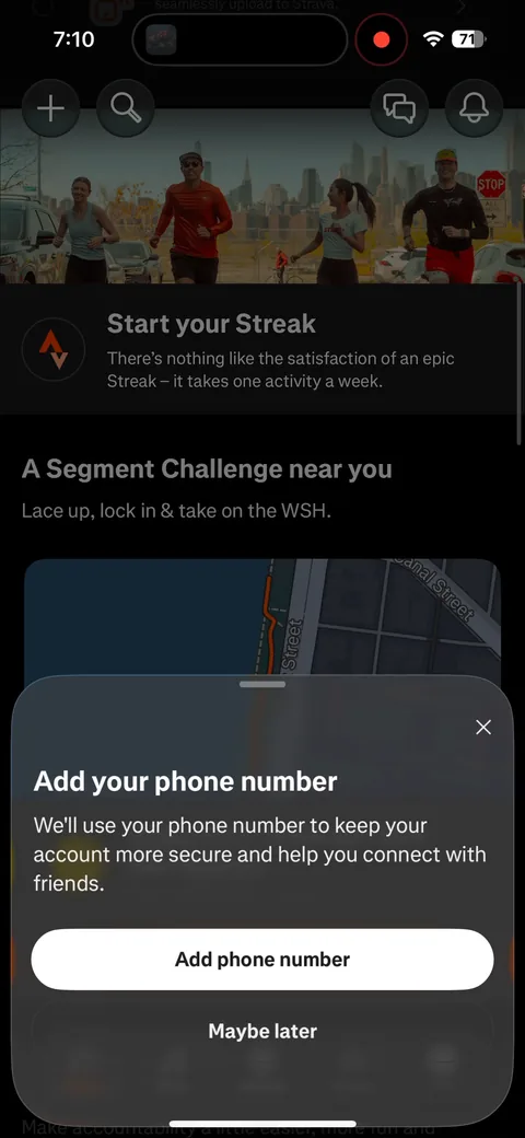 Strava onboarding screen 83: 'Add your phone number' again, now as a bottom sheet on home: 'keep your account more secure and help you…