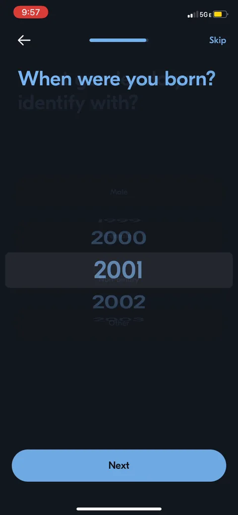 Vos onboarding screen 27: Age via 'when were you born,' with a skip in the corner